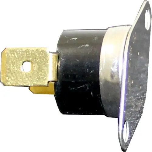 Schalter von Wolf, vermutlich Thermo-Bimetall, mit Metallplatte und goldfarbenem Anschluss. Geeignet für Temperaturregelung in Heizsystemen.